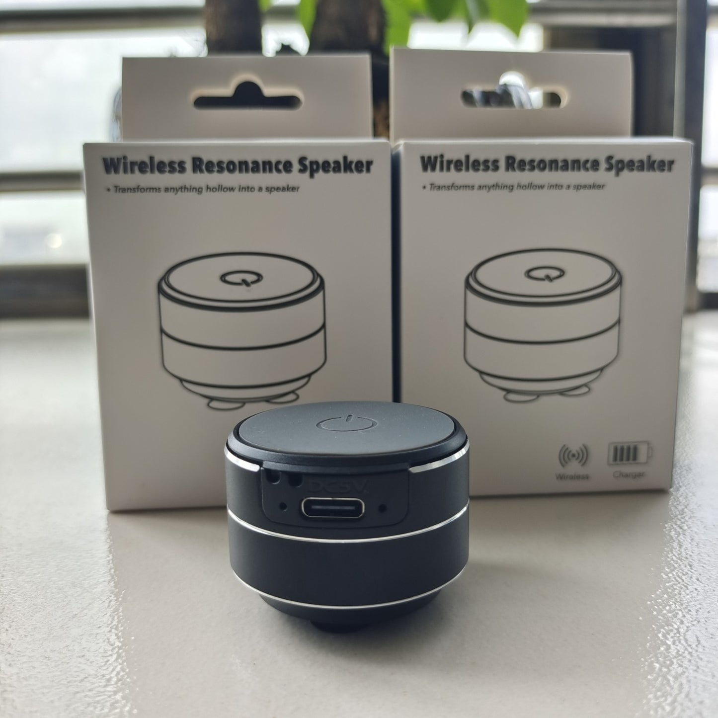 Mini Alto-Falante de Condução Óssea Portátil - Transforme qualquer superfície em som.