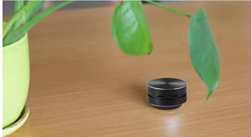 Mini Alto-Falante de Condução Óssea Portátil - Transforme qualquer superfície em som.