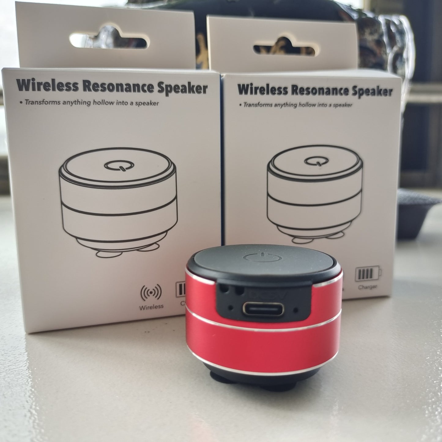 Mini Alto-Falante de Condução Óssea Portátil - Transforme qualquer superfície em som.