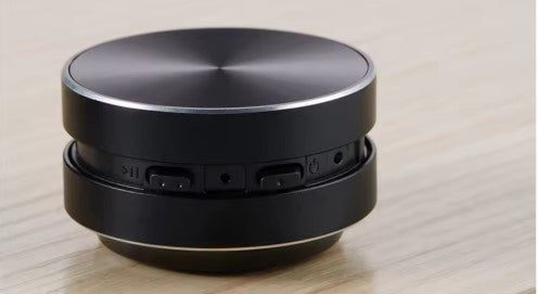 Mini Alto-Falante de Condução Óssea Portátil - Transforme qualquer superfície em som.